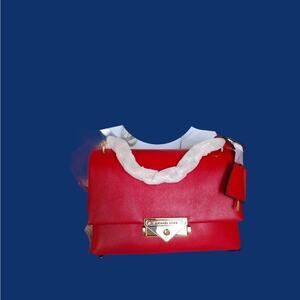 Michael Kors bright red Cece NWT with gold chain or adjustable crossbody strap.